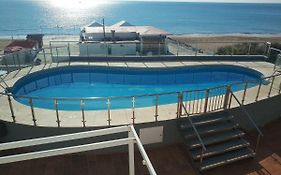 Islantilla-Apartamento con piscina y garaje en primera línea de playa